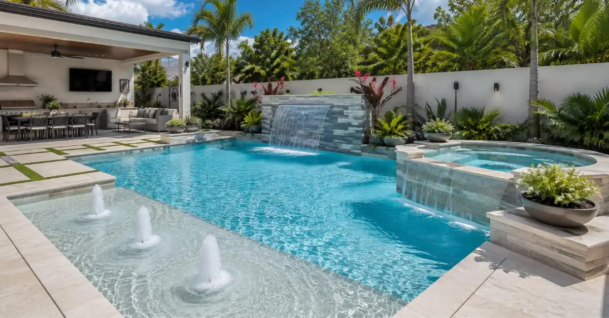 pool waterfalls and fountains, sun shelf with bubblers, raised spa spillway Florida backyard pool design ideas